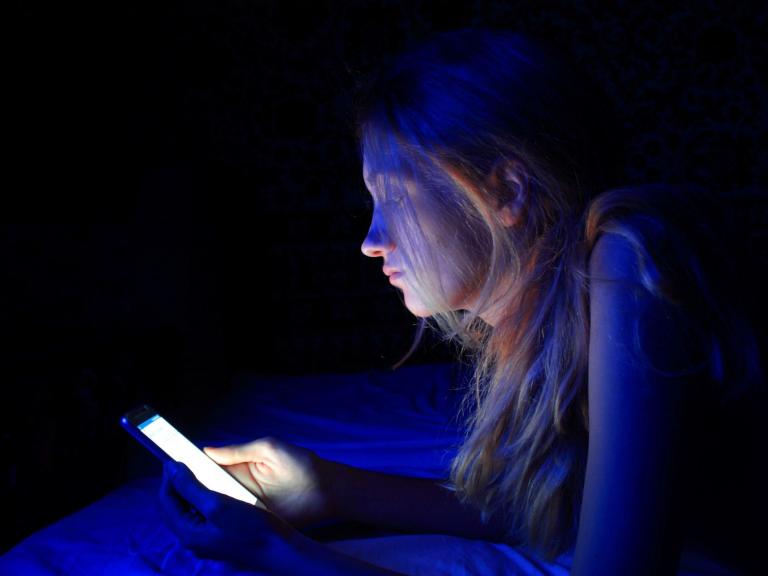 Staring at your phone at night could be linked to depression, study finds