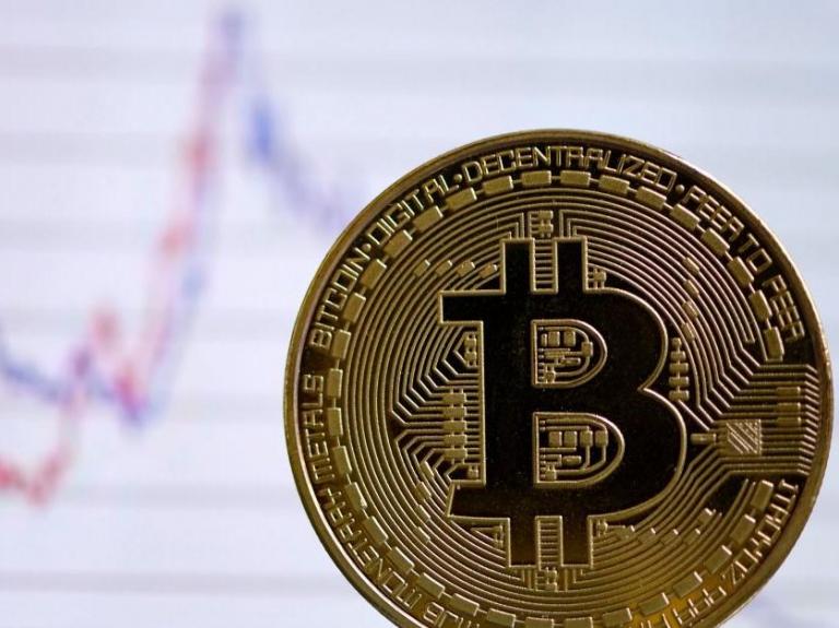 Bitcoin price hits 2020 record as investors turn to cryptocurrency during pandemic