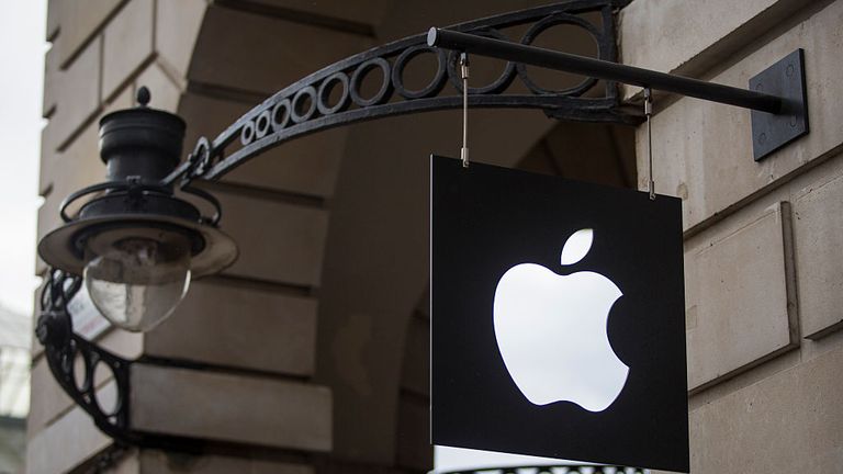 LONDON, ENGLAND - SEPTEMBER 29: The Apple logo sits on a sign outside company's Covent Garden store on September 29, 2016 in London, England. Technology company Apple has announced that Battersea Power Station, a Grade II listed building and former coal-fired power station, is to be its new London headquarters by 2021. The building, which has been unoccupied for decades, is currently undergoing a £9 billion restoration. (Photo by Jack Taylor/Getty Images) 