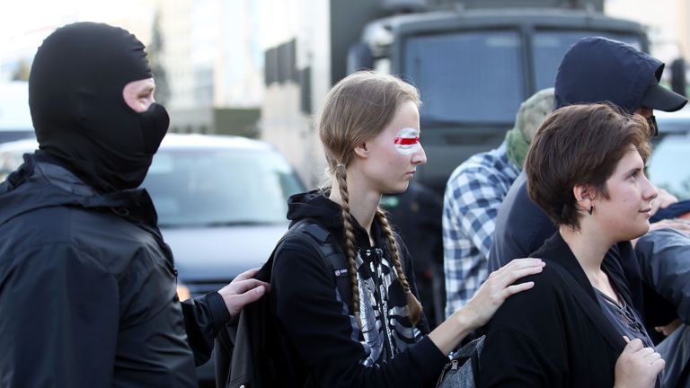 Women are arrested by Police on September 20, 2020 in Minsk during a demonstration called by opposition movement for an end to the regime of authoritarian leader Alexander Lukashenko. - Belarusian authorities brought today military trucks and barbed wire into central Minsk ahead of a planned opposition march, a day after police detained hundreds of women demonstrators. (Photo by - / TUT.BY / AFP) (Photo by -/TUT.BY/AFP via Getty Images) 