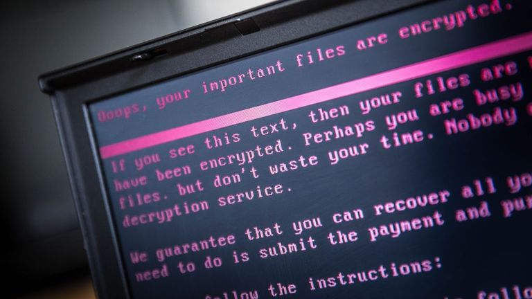 A laptop displays a message after being infected by a ransomware as part of a worldwide cyberattack on June 27, 2017 in Geldrop. The unprecedented global ransomware cyberattack has hit more than 200,000 victims in more than 150 countries, Europol executive director Rob Wainwright said May 14, 2017. Britain's state-run National Health Service was affected by the attack. / AFP PHOTO / ANP / Rob Engelaar / Netherlands OUT (Photo credit should read ROB ENGELAAR/AFP via Getty Images) 