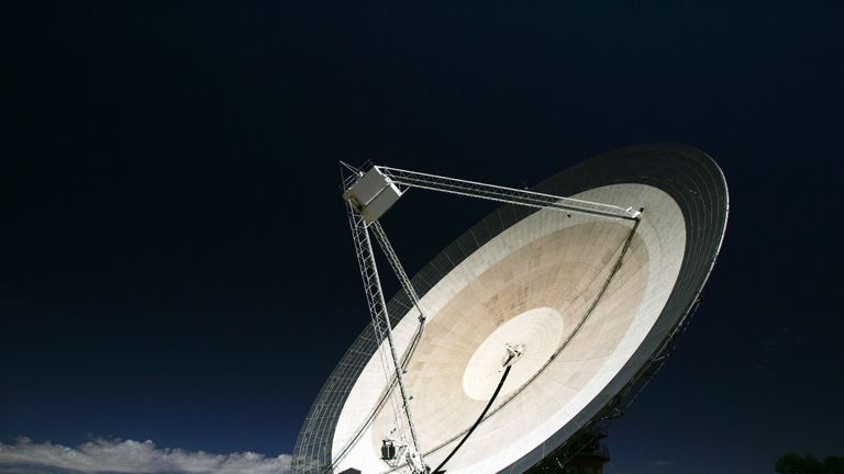 PARKES, AUSTRALIA - OCTOBER 27: (EDITORS NOTE: A POLARIZING FILTER WAS USED IN THE CREATION OF THIS IMAGE): The Australian Commonwealth Scientific and Industrial Research Organisation's (CSIRO) Australia Telescope National Facility (ATNF) Parkes Observatory radio telescope points to the sky October 27, 2006 in Parkes, Australia. The telescope, affectionately known as "The Dish" is currently observing pulsars at the centre of the Milky Way galaxy. The Dish is one of the largest radio telescopes in the Southern Hemisphere, and was used by NASA during the Apollo moon missions. The Dish also starred in a massively popular Australian movie of the same name in 2000. (Photo by Ian Waldie/Getty Images)