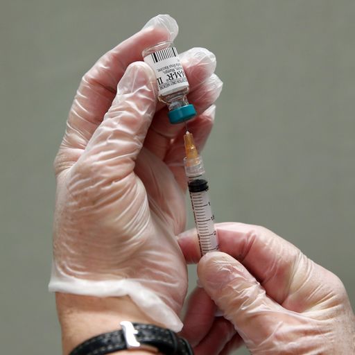 'More than one vaccine' will be available in the next three to six months, government scientist says